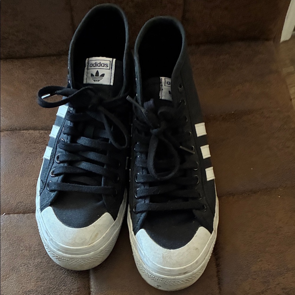 Adidas women’s Black and White Classic platform Sneakers